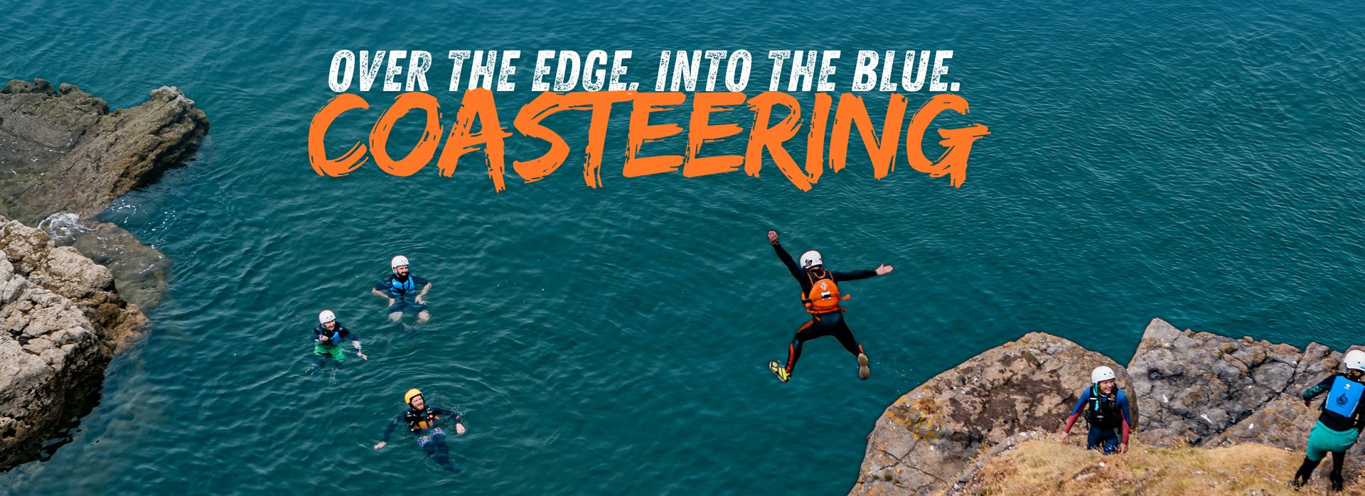 Group coasteering along the Gower coastline