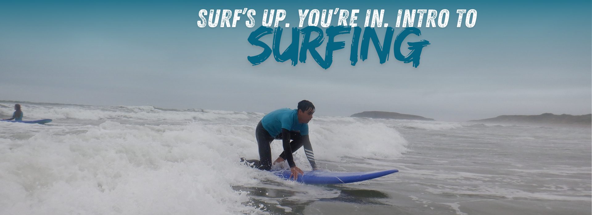 Group surfing lesson on the beach
